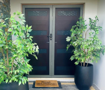 Hinged security screen door