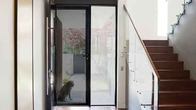 PrivacyGuard security screen installed on a front door